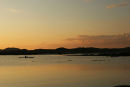 07-1906 Canoeist at Sunset, in the Sound of Iona, Taken from the Isle of Mull